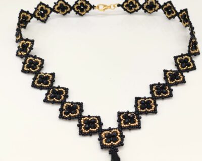 Elegantný luxusný zlatočierny náhrdelník z brúsených korálok